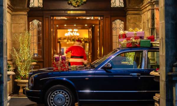 Santa Walking into Hotel