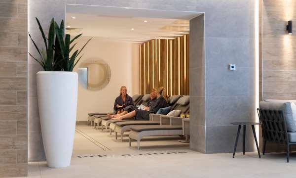 3 ladies sat in relaxation area 