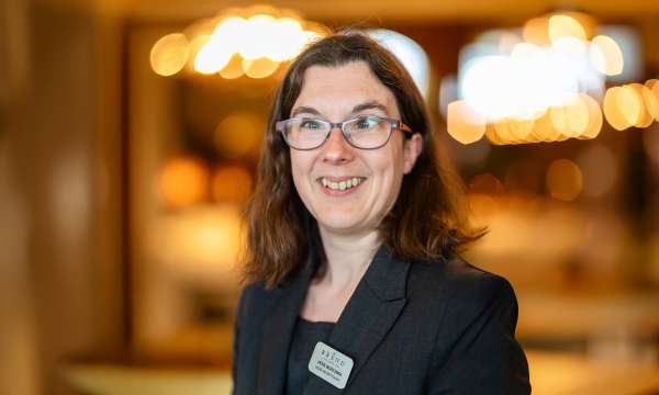 Jess smiling at the camera 