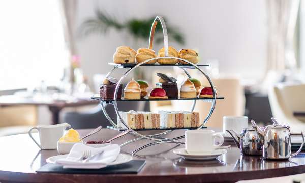 Afternoon Tea on a wooden table in The White Room