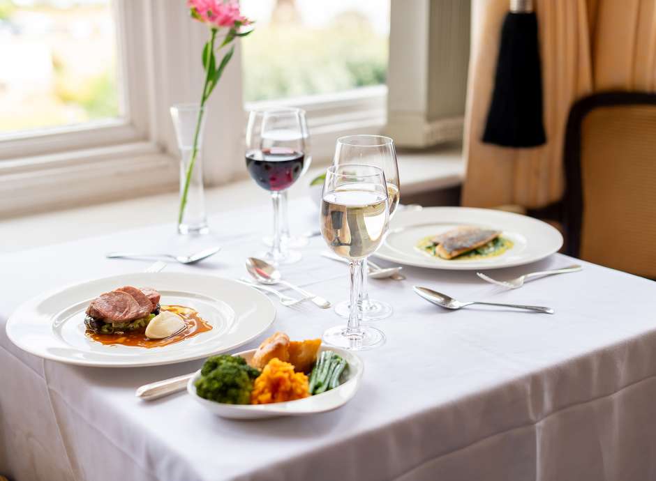 Beef and fish dish on a table in the Jubilee Restaurant at The Victoria Hotel