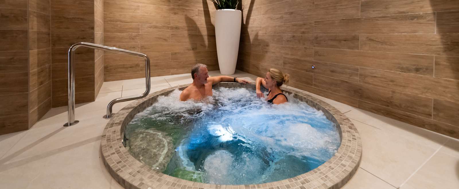 couple in spa bath