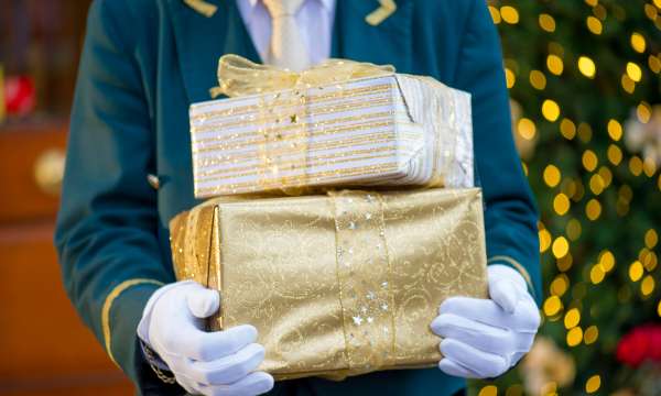 Porter Holding Presents Outside Victoria Hotel