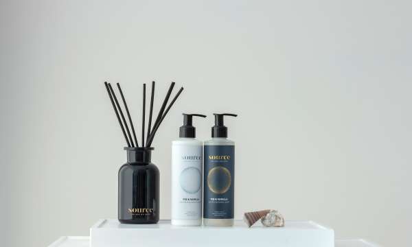 Source Spa candle and cream products