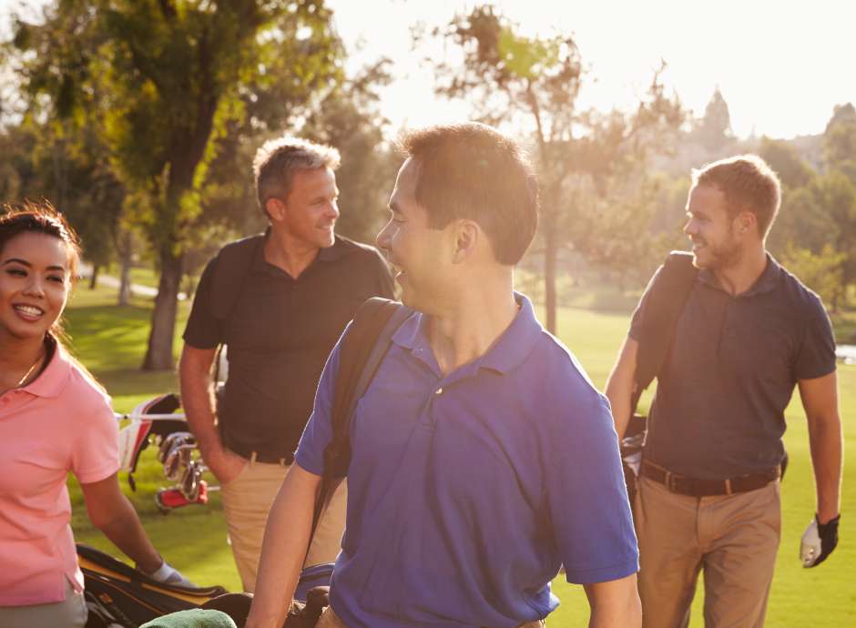 Group of Friends Playing Golf