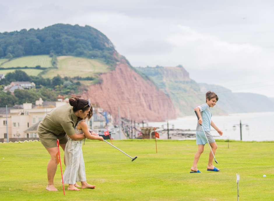 Mother and Children on Putting Green in Sidmouth